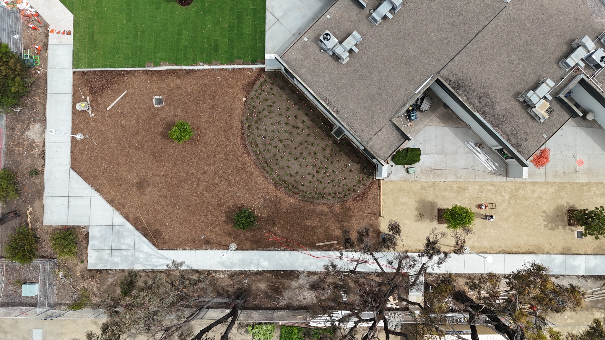 Concrete walkways and landscape improvement aerial view